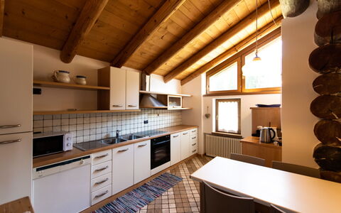 Chalet Baita Tabià Dolomites: Cabinetry, Countertop, Property, Wood, Kitchen, Sink, Kitchen Stove, Lighting, Interior Design, Drawer