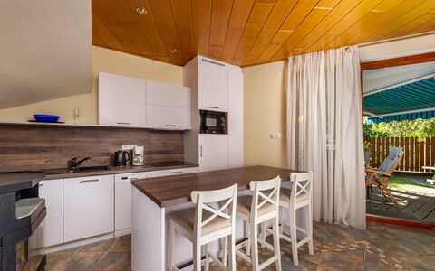 Polgar: Countertop, Cabinetry, Furniture, Wood, Kitchen Stove, Kitchen Appliance, Interior Design, Kitchen, Sink, Flooring