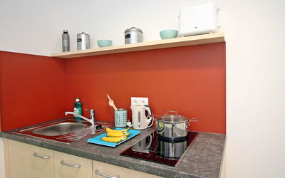 Vineyard 10.2: Room, Orange, Furniture, Property, Turquoise, Shelf, Kitchen, Countertop, Material Property, Interior Design