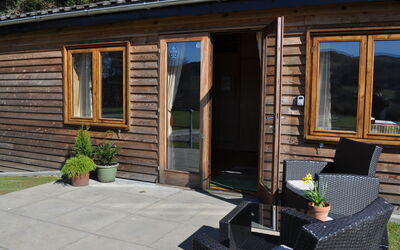 Tay View Lodges 100.4: Property, Home, House, Siding, Building, Cottage, Real Estate, Log Cabin, Room, Window