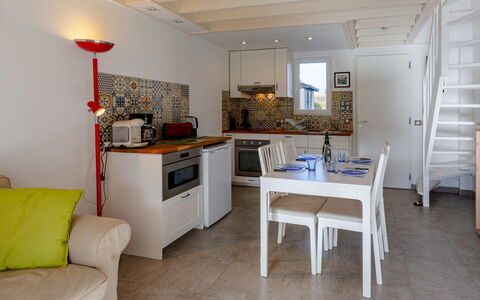 Cabourg Cottage: Furniture, Interior Design, Flooring, Wood, Floor, Kitchen, Room, Ceiling, Major Appliance, Apartment