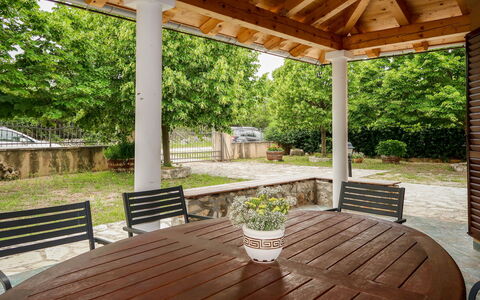 Ana: Wood, Furniture, Outdoor Furniture, Table, Ceiling, Shade, Porch, Chair, Pavilion, Column