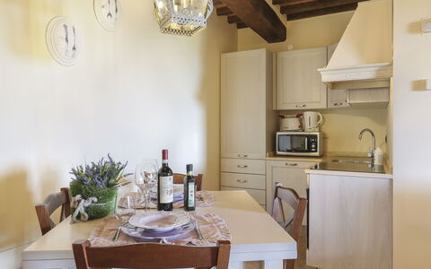 Appartamento Ginepro - Borgo in Chianni: Room, Property, Dining Room, Furniture, Interior Design, Building, Ceiling, Table, House, Real Estate