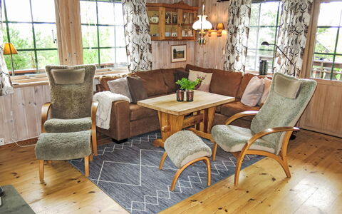 Skafjellstoga: Table, Furniture, Property, Couch, Window, Plant, Building, Chair, Houseplant, Wood