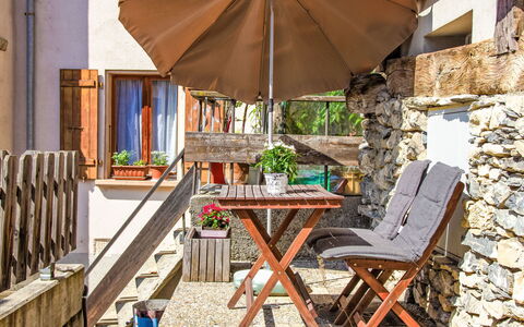 Le Raccard: Furniture, Table, Plant, Building, Outdoor Table, Umbrella, Wood, Shade, Outdoor Furniture, Chair