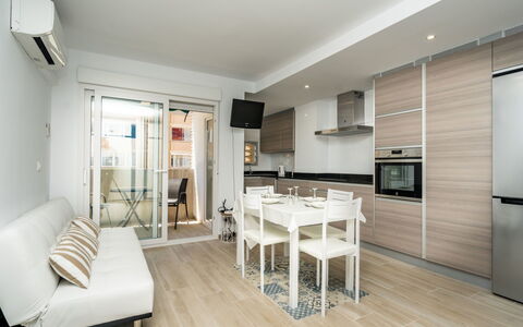 Jávea 179: Furniture, Couch, Table, Television, Building, Comfort, Countertop, Cabinetry, Living Room, Wood