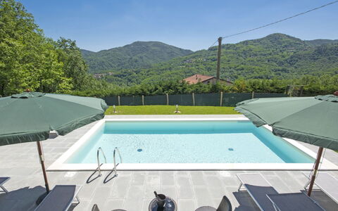 Agr. Castello della Mugazzena: Sky, Water, Swimming Pool, Azure, Shade, Building, Plant, Outdoor Furniture, Rectangle, Chair