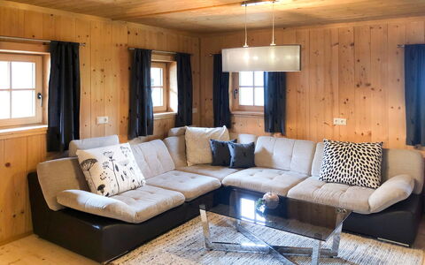 Alm Chalet: Furniture, Property, Couch, Interior Design, Wood, Window, Table, Floor, Flooring, Living Room
