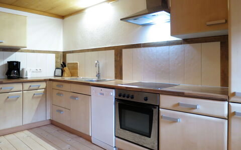 Alm Chalet: Countertop, Cabinetry, Furniture, Building, Kitchen Appliance, Kitchen Stove, Kitchen, Kitchen Sink, Tap, Home Appliance