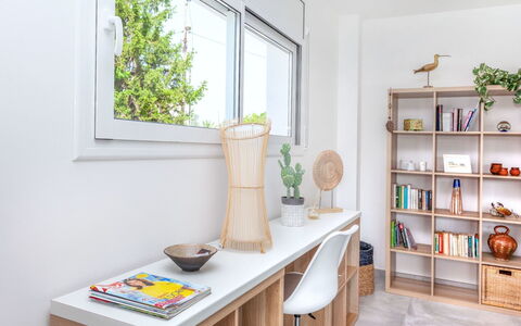 Almendro: Furniture, Shelf, Room, Property, Desk, Interior Design, Shelving, Table, Home, Yellow