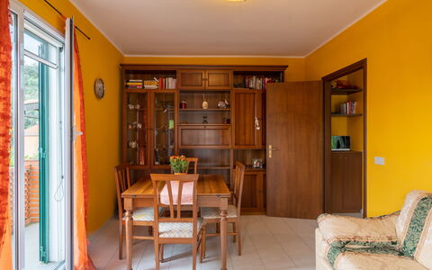 Ludovica: Furniture, Property, Table, Cabinetry, Plant, Couch, Picture Frame, Door, Wood, Chair
