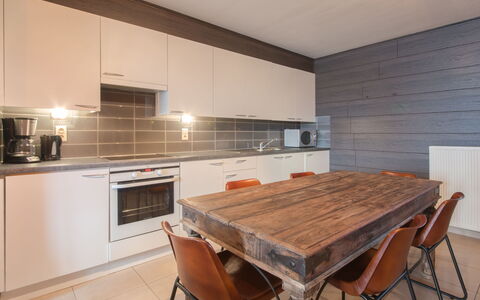 Bredene 310: Furniture, Cabinetry, Property, Countertop, Wood, Kitchen, Interior Design, Table, Kitchen Stove, Flooring