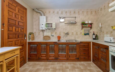 Florencia: Property, Room, Furniture, Cabinetry, Kitchen, Countertop, Building, Interior Design, Floor, Tile