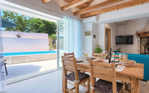 Mala Mare: Furniture, Table, Wood, Architecture, Interior Design, Floor, Porch, Flooring, Shade, Wall