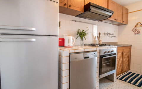 Serenella: Room, Cabinetry, Property, Kitchen, Countertop, Major Appliance, Furniture, Refrigerator, House, Interior Design