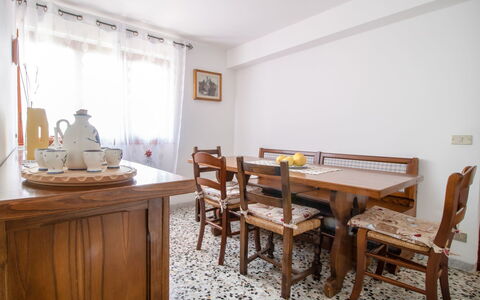 Serenella: Room, Furniture, Property, Dining Room, Table, Interior Design, Floor, Building, Yellow, Real Estate