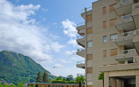 Apt. Lugano Majestic Panorama: Residential Area, Sky, Architecture, Property, Daytime, Building, Apartment, Neighbourhood, Condominium, Town