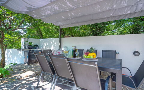 Ivona: Furniture, Table, Plant, Building, Chair, Shade, Outdoor Furniture, Tree, Leisure, Outdoor Table