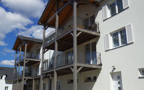 Frymburk 10: Residential Area, Facade, Home, Apartment, Balcony, Urban Design, Door, Concrete, Porch, Shade
