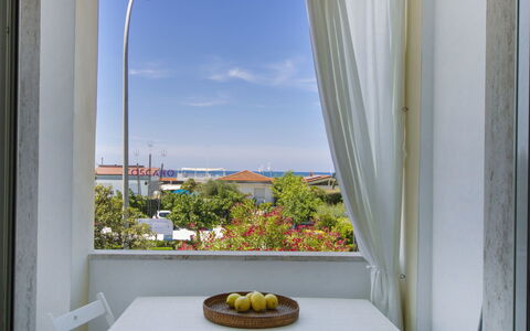 Sandra: Room, Property, Yellow, Interior Design, Window, Real Estate, House, Balcony, Window Treatment, Building