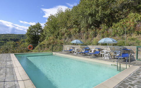 Castelnuovo di Garfagnana 648: Water, Sky, Property, Cloud, Swimming Pool, Umbrella, Azure, Plant, Outdoor Furniture, Body Of Water