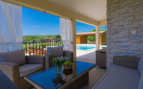 Eugen: Plant, Building, Furniture, Sky, Azure, Table, Shade, Couch, Window, Architecture