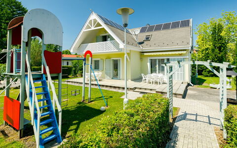 Sapphire: Plant, Sky, Property, Building, Green, Tree, Shade, Land Lot, Window, Grass