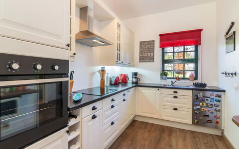Roberts: Countertop, Room, Kitchen, Property, Furniture, Cabinetry, Interior Design, Building, Wood Flooring, Floor