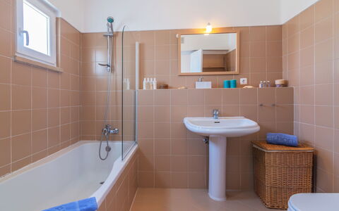 Roberts: Bathroom, Room, Property, Tile, Interior Design, Floor, Wall, Plumbing Fixture, Architecture, Building