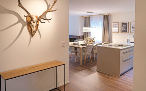 Monazit: Room, Floor, Antler, Interior Design, Property, Horn, Lighting, Furniture, Wall, Flooring