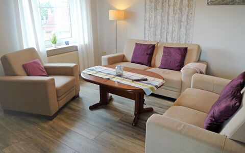 Alina: Living Room, Room, Furniture, Property, Interior Design, Floor, Purple, Laminate Flooring, Coffee Table, Wood Flooring