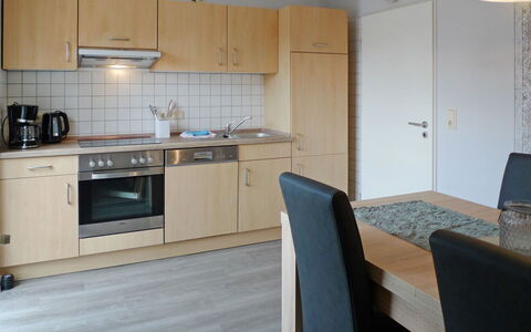 Alina: Countertop, Room, Property, Furniture, Kitchen, Cabinetry, Major Appliance, Kitchen Stove, Floor, Building