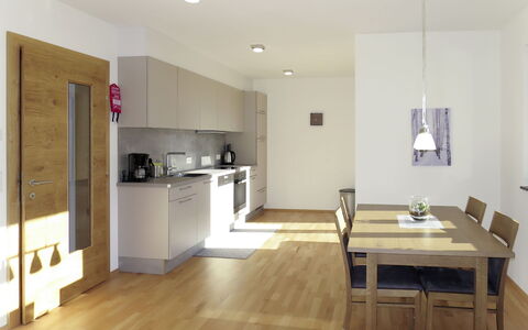 Zillertalblick: Room, Furniture, Floor, Interior Design, Property, Wood Flooring, Kitchen, Cabinetry, Countertop, Building