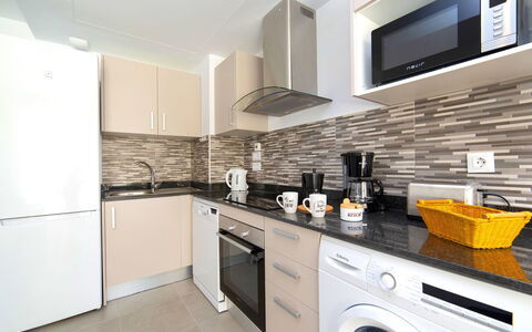 Calpe Beach i: Property, Countertop, Room, Kitchen, Cabinetry, Furniture, Interior Design, Building, Yellow, House
