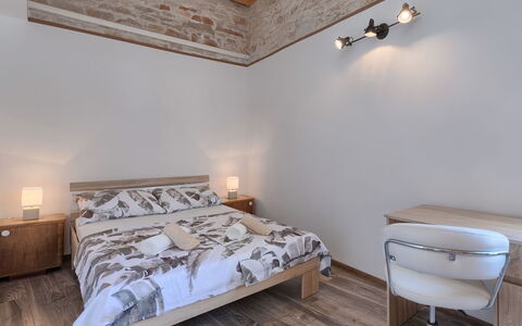 Evelina: Bedroom, Furniture, Room, Property, Bed, Wall, Bed Frame, Bed Sheet, Interior Design, Bedding