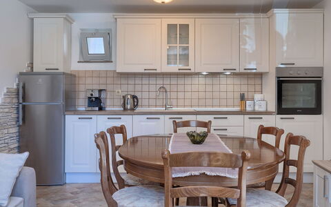 Evelina: Room, Furniture, Property, Interior Design, Building, Kitchen, Dining Room, Floor, Table, House