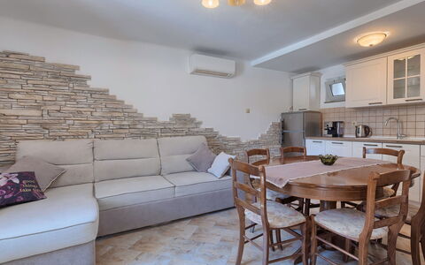 Evelina: Table, Furniture, Couch, Lighting, Wood, Architecture, Interior Design, Flooring, Living Room, Floor