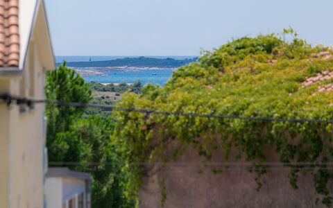 Evelina: Sky, Plant, Building, Azure, Water, Window, Body Of Water, Land Lot, Landscape, Groundcover