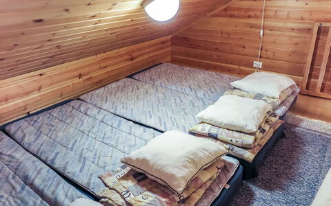 Ylläsmukka a 3: Wood, Floor, Flooring, Bedroom, Bed, Home, Hardwood, Wood Stain, Bedding, Wood Flooring