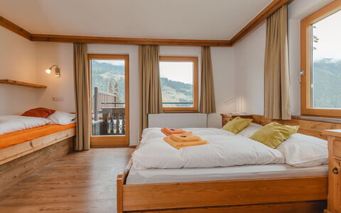Mitteregg: Furniture, Property, Window, Comfort, Building, Azure, Wood, Orange, Textile, Interior Design