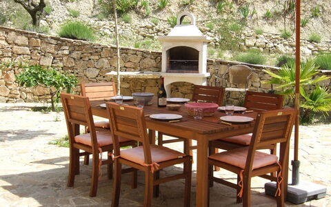 L'Oliveraie: Furniture, Table, Outdoor Table, Property, Patio, Room, Kitchen & Dining Room Table, Chair, Dining Room, Outdoor Furniture