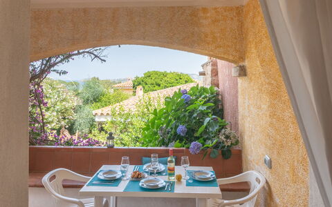 Trudi: Table, Plant, Property, Furniture, Building, Flowerpot, Chair, Azure, Window, Shade