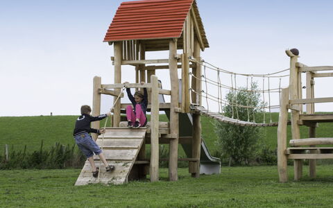 Ganuenta: Public Space, Playground, Outdoor Play Equipment, Human Settlement, Playground Slide, Recreation, Leisure, Fun, Grass, Tree