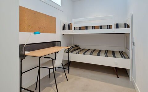 La Senia: Furniture, Room, Bed, Property, Interior Design, Building, Desk, Shelf, Loft, Table