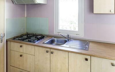 Camping la Plage 649.1: Countertop, Property, Kitchen, Room, Cabinetry, Sink, Kitchen Sink, Furniture, Major Appliance, Drawer