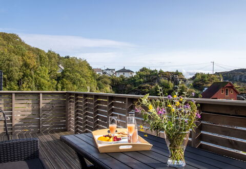 Langevåg 604: Cloud, Flower, Sky, Plant, Property, Flowerpot, Furniture, Table, Building, Outdoor Furniture