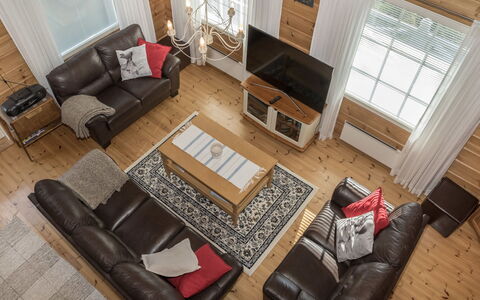 Koskelo: Couch, Furniture, Interior Design, Flooring, Wood, Living Room, Floor, Wood Flooring, Room, Home