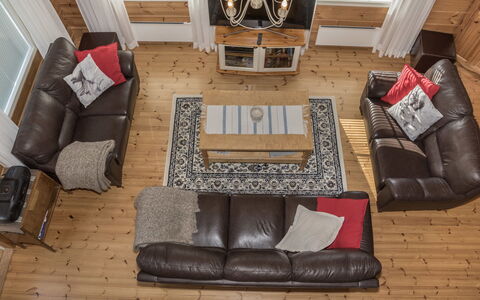 Koskelo: Couch, Furniture, Flooring, Wood, Interior Design, Floor, Living Room, Wood Flooring, Home