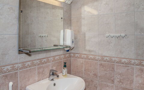 Koskelo: Bathroom Sink, Plumbing Fixture, Sink, Bathroom, Wall, Flooring, Interior Design, Tap, Mirror, Floor