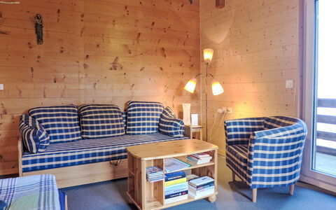 Chalet Ninette: Table, Furniture, Property, Comfort, Couch, Building, Wood, Lighting, Interior Design, Pillow